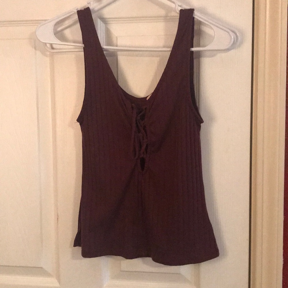 Burgundy tank top. Ties in front.